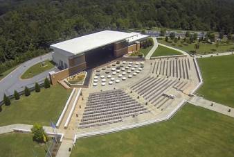 outdoor-amphitheater-with-tiered-seating-next-to-a-building